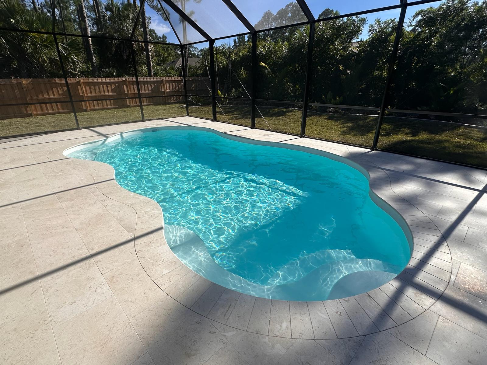 Completed fiberglass pool by Pelican Pools