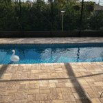 Kids splashing on the Wylela shallow steps while adults lounge