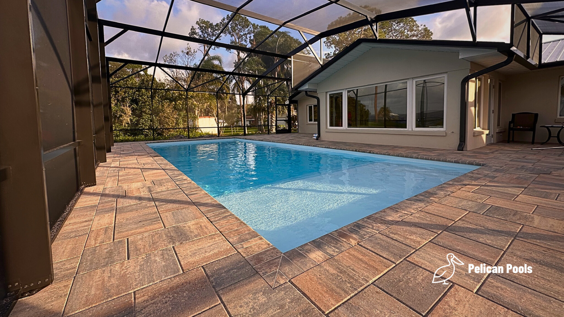 Wylela Beach Ultra fiberglass pool with wide beach entry and space for in-water recliners — Installed by Pelican Pools and fast installation.