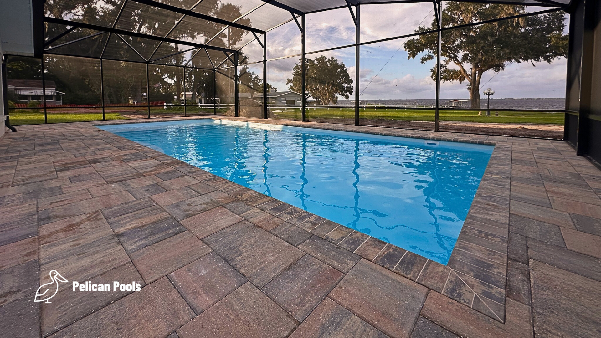 Wylela Beach Ultra backyard pool with wide beach entry, installed by Pelican Pools with fast installation for relaxed family lounging.