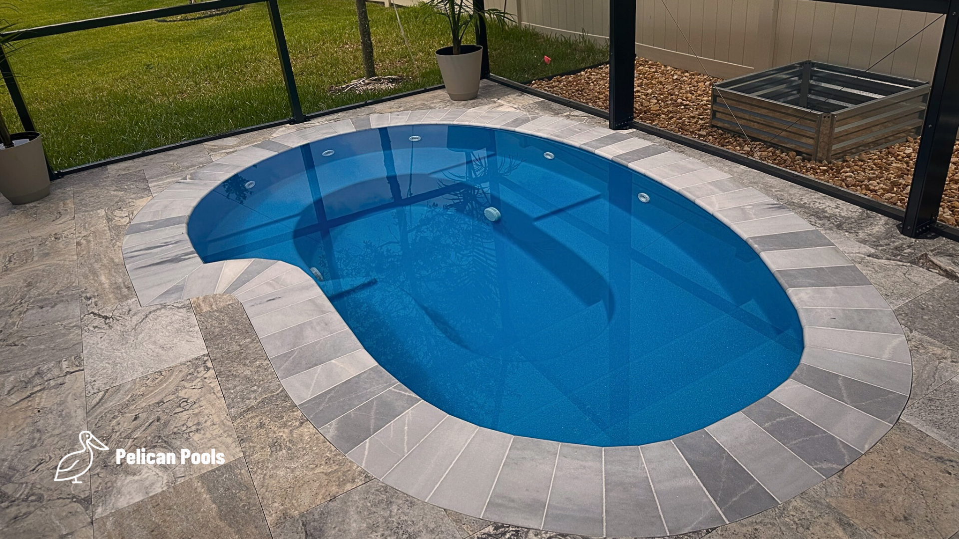 Charlotte Spa paired with a backyard fiberglass pool for year-round soaking, installed by Pelican Pools with fast installation.