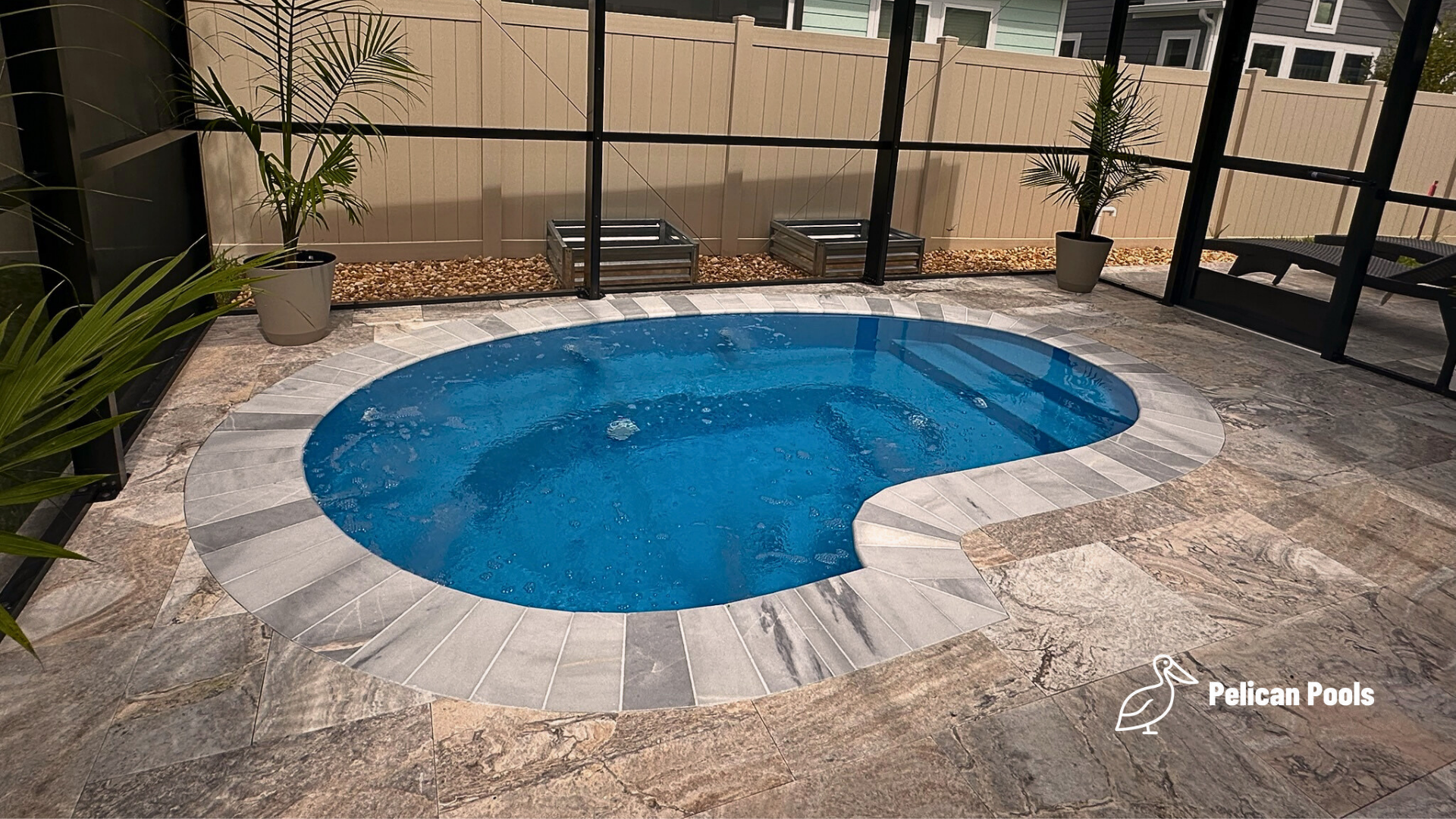 Charlotte Spa kidney-shaped fiberglass spa, Installed by Pelican Pools with fast installation, compact footprint ideal for small indoor spaces.