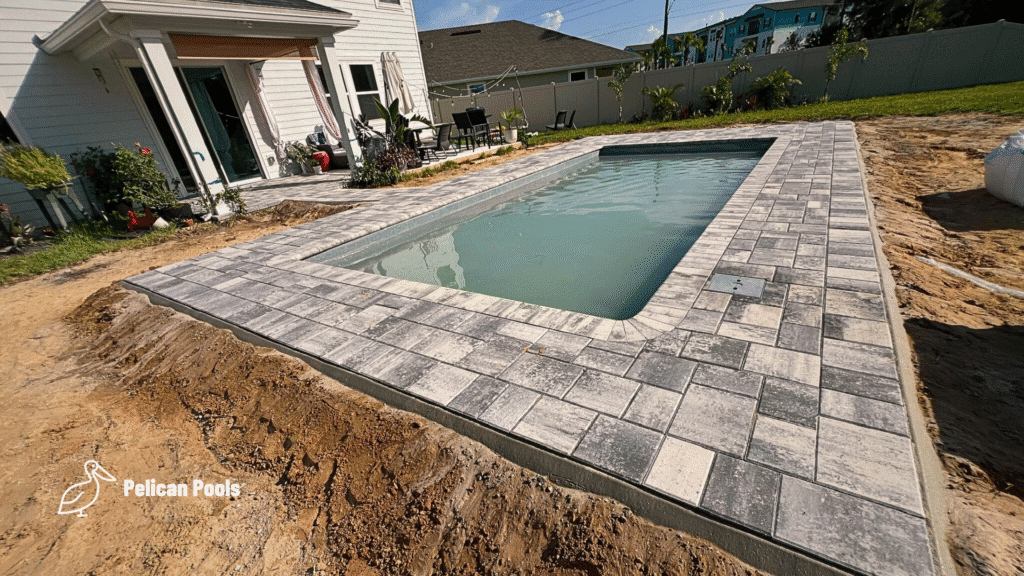 Completed pool coping and deck installation near Flagler Beach home.