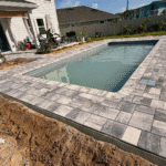 Completed pool coping and deck installation near Flagler Beach home.