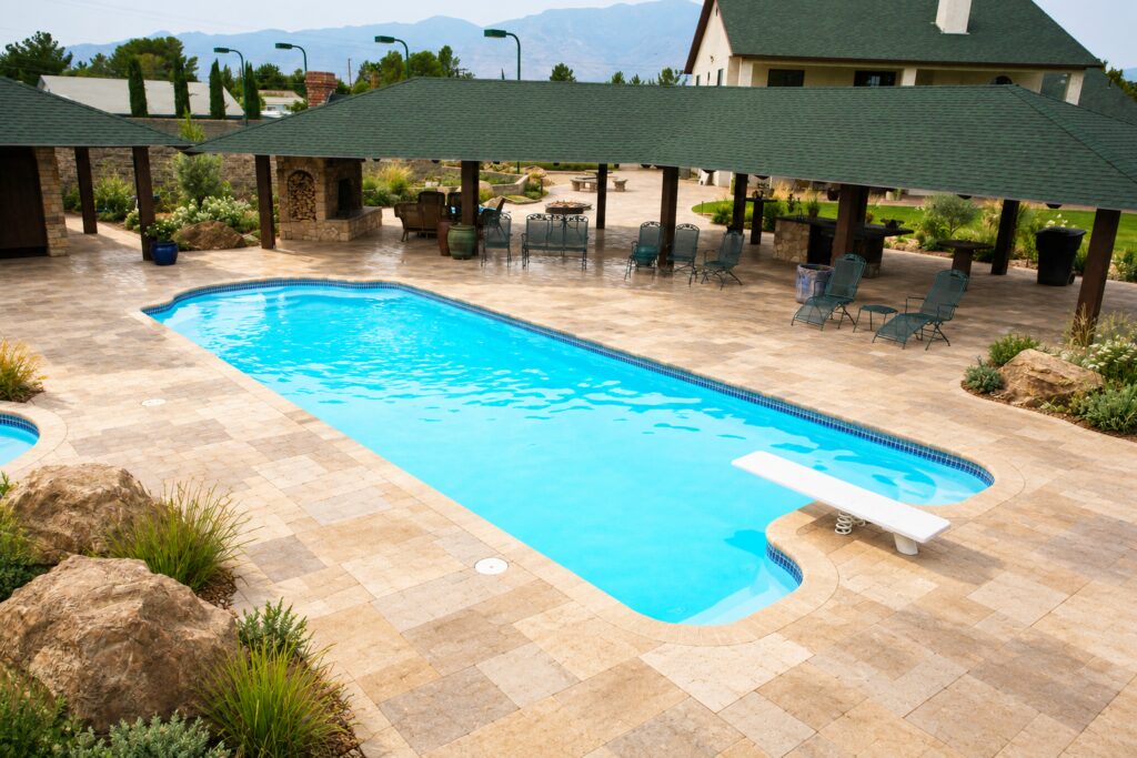 Dallas pool with diving board, covered pavilion and limestone paving. Digitally edited design inspiration.