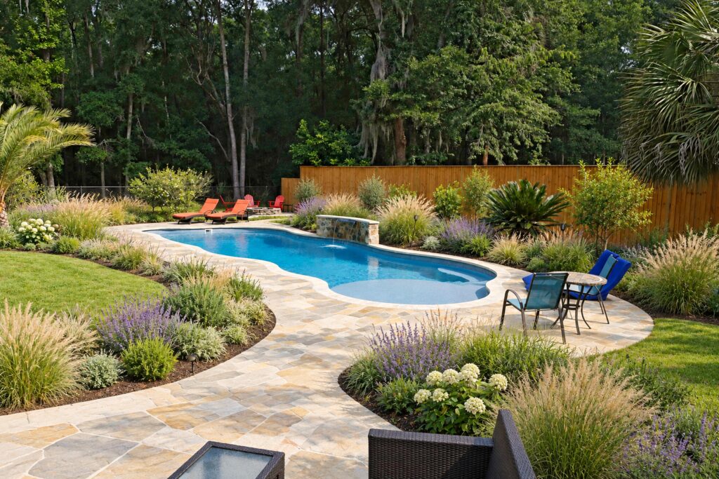 San Juan Daytona Beach Pool – Coastal Meadow Stone Design Inspiration Daytona Beach pool in a coastal meadow garden with natural stone paving. Digitally edited design inspiration.